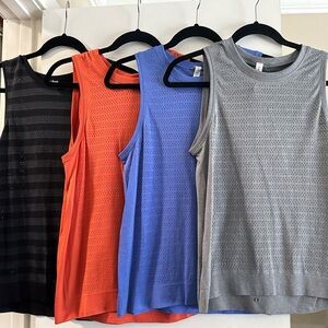 Lululemon Athletica Black and Orange Tank Tops